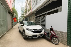 nhà hxh 7 chỗ - 70m2 (5x14m) - 4 tầng sát mặt tiền - giáp q1 - 12.x tỷ tl