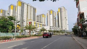 nhà mt thống nhất. p. đông hoà. đối diện bcons city. dt: 125.7m2 (5.5x 23m) đường 32m. giá: 15.5 tỷ