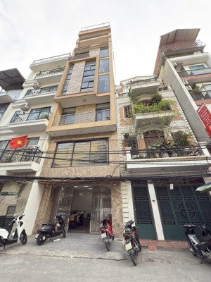 mp tây sơn - 112m2 - 7t thang máy - 55tỷ - mặt tiền 4.1m - vỉa hè - hầm để xe - giao thông thuận