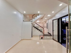 nhà lô góc 4 tầng thành tô gara oto nhiều cửa sổ thoáng sáng