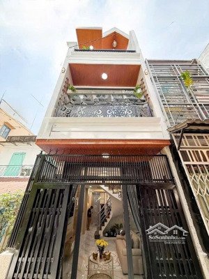 nhà 2lầu mới hxh đường phan đăng lưu , p1 , quận -pn