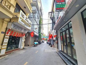 bán nhà tân mai - 7 tầng - thang máy - gara - ô tô tránh - ngõ thông - 15 tỷ