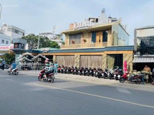 bán nhà mặt tiền nơ trang long giá ngộp bank rẻ hơn giá hẻm, dt (15m x 52m), có hđt