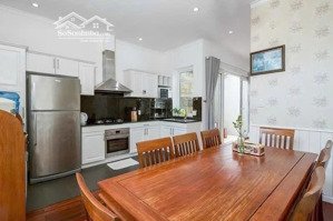 nhà 4 tầng mặt đường lê thước, dt 90m2, ngay biển mỹ khê đà nẵng