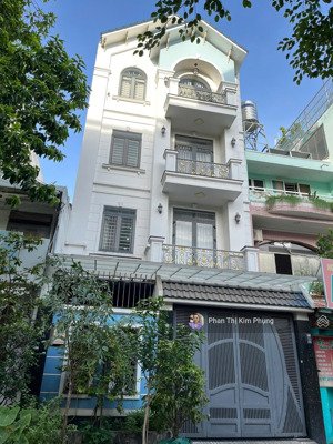 bán nhà đỗ công tường dt 5x20m, trệt 4 lầu st, thang máy giá 15.5 tỷ