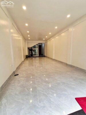 NHÀ MẶT PHỐ TRUNG PHỤNG 42 TỶ ĐỐNG ĐA 7 TẦNG THANG MÁY