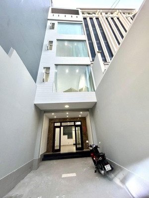 building có thang máy mặt tiền đường sông thao p.2 quận tân bình