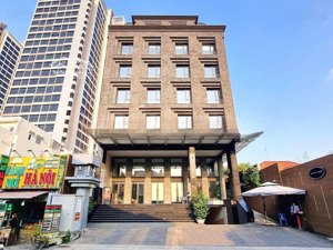 gấp bán tòa nhà góc 2 mt đặng thùy trâm, q. bt - dt 10x25m - hầm 6 tầng - tn 400 tr/th - giá 75 tỷ