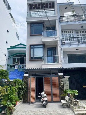 bán nhà đẹp 4m x 20m, 4 tầng, ô tô đậu trong nhà, giá chỉ 16 tỷ 9. mặt tiền đường số tân quy quận 7