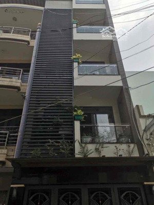 nhà mặt tiền đường 8m 5 tấm ngay chợ vải tân bình