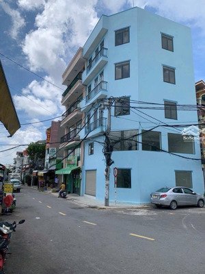 bán toà nhà góc 2mt đường an phú đông 1. ngay đoạn chợ kinh doanh sầm uất. đường 10m.