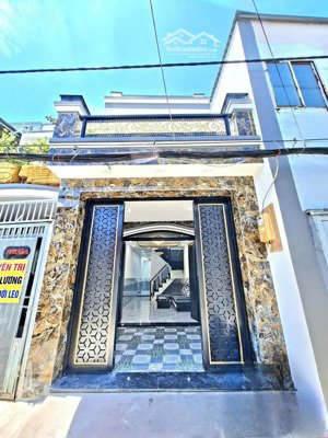 bán nhà đẹp - mới hoàn thiện 1 lầu - tiếp giáp quận 7