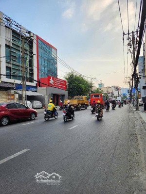 tòa nhà lớn-rộng đẹp thuê cao giá tốt-bán nhà 8,1x20-5 tầng mặt tiền nhánh thạch lam tân phú-hiếm