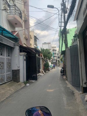 bán nhà hẻm oto thông nơ trang long gần chợ bà chiều 5 tầng btct giá 10 tỷ 7 đã giảm