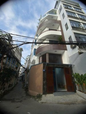 mini building góc 2mt phú nhuận - khu phan xích long - 6 tầng - nở hậu - hđt 40tr/tháng - chỉ 13 tỷ