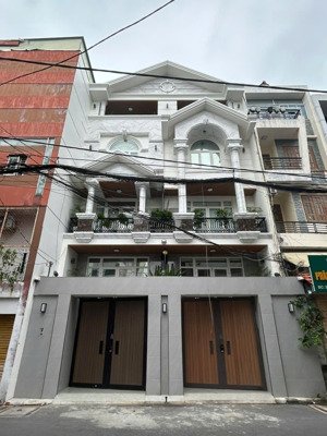 cho thuê nhà mt lê trung nghĩa khu k300. dt: 9x20m. trệt 3 lầu, nhà mới sẵn máy lạnh. giá 45tr.