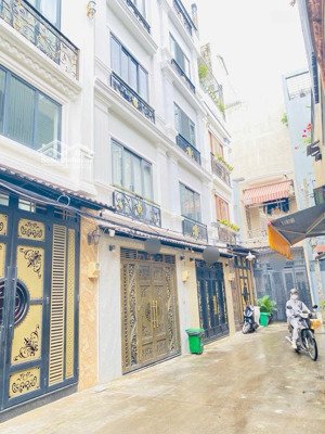 bán nhà hiệp nhất quận tân bình - 4 tầng 54m2 hẻm xe hơi - gần bệnh viện thống nhất - quận 1