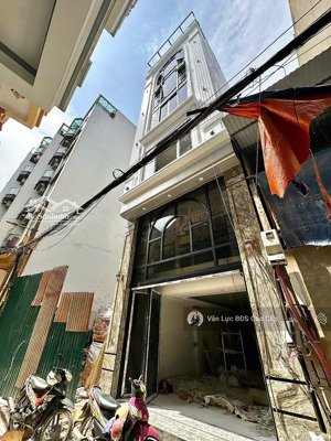 cần bán nhà trung tâm đống đa 66m 8 tầng thang máy oto tránh thông sàn vp giá 28 tỷ