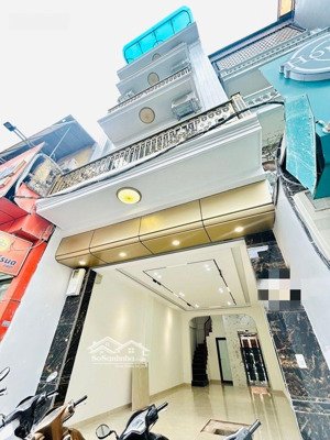 mặt phố nguyễn đức cảnh 5 tầng 59.1m mt 4.5m , thang máy , buôn bán sầm uất , giá 18,5 tỷ