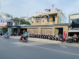 bán nhà mặt tiền nơ trang long giá ngộp bank rẻ hơn giá hẻm, dt (15m x 52m), có hđt