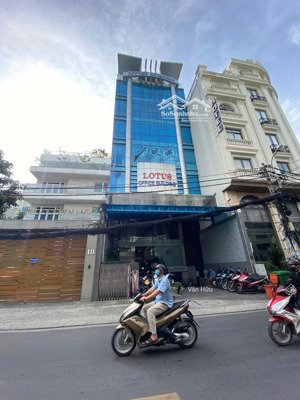 tòa nhà mặt tiền phổ quang, q. tân bình - dt: 11x25m - hầm 7 tầng - hđt: 300 triệu - giá: 65 tỷ