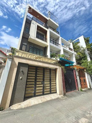 gấp bán, nhà 3tầng (4.5 x 29) hẻm xe tải thông, đang cho thuê 360tr/năm đường hoàng hoa thám