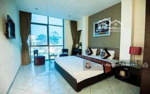 siêu phẩm phố hoàng cầu, 8 tầng thang máy, dt 65m2 kinh doanh khách sạn 13 phòng, oto đỗ cửa.