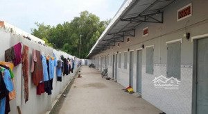 tôi cần bán gấp dãy trọ 180m2, thu nhập hơn 240tr/năm, sổ hồng riêng, hẻm xe hơi