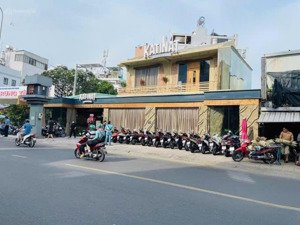 bán nhà mặt tiền nơ trang long giá ngộp bank rẻ hơn giá hẻm, dt (15m x 52m), có hđt