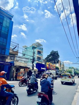 tòa nhà mt lê quang định 1600m2 sàn - 300m2 đất - hầm 7 tầng - tn: 320 triệu/tháng - chỉ 75 tỷ tl