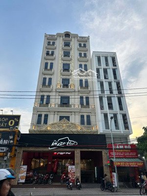 tòa nhà mt huỳnh tấn phát q7 - hầm 7 tầng - dt: 19m x 30m, thu nhập 900tr/tháng - 115 tỷ - 219tr/m2