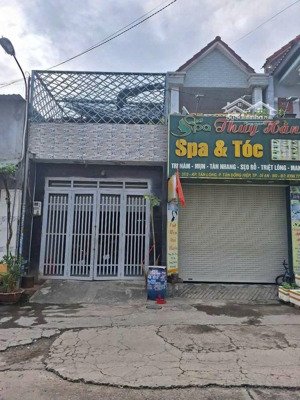 nhà lầu trệt mặt tiền kinh doanh được ,gần chợ tân long,tp dĩ an.