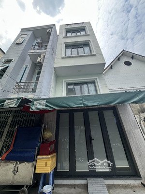 quận 7 bùi văn ba , dt: 3.7x9m,1 trệt lửng, 2 lầu, 2 sân thượng trước sau,7pn 7wc, chỉ 5.35t