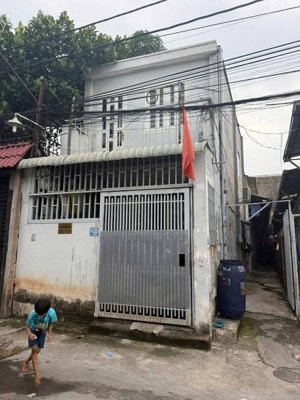 nhà lầu trệt 5 phòng trọ gần chợ dĩ an 2, dt 125m2 giá 4,5 tỷ