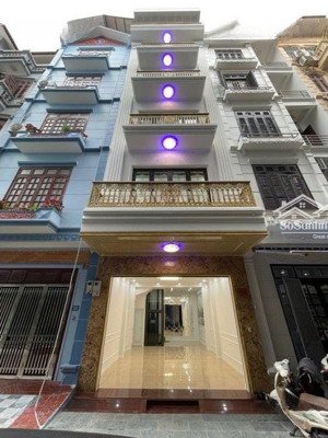 cho thuê nhà thang máy hiện đại 60m x 6 tầng ô tô vào nhà tại 61 lê văn lương mt 5m giá 28tr