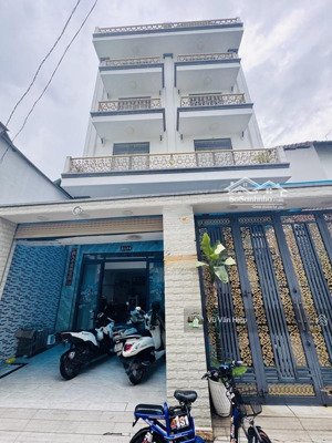 nhà 6 lầu 2 mặt tiền 9.4 x14 xe hơi ra vào an dương vương chỉ hơn 9 tỷ