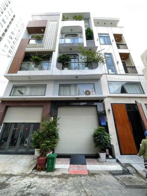 nhà ngay ngã 4 bốn xã 4x14m trệt, lửng, 2 lầu, sân thượng hẻm nhựa 7m đồng bộ giá 7 tỷ tl