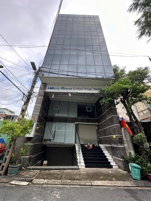 bán tòa nhà chdv lê quang định quận bình thạnh (8x22m) hầm 6 tầng tn 250 triệu/tháng