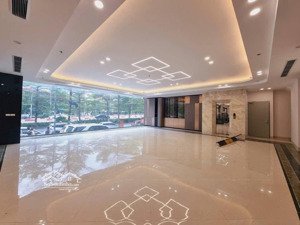bán tòa nhà văn phòng 12 tầng mặt phố đường láng lô góc, 2 hầm, 2 thang máy, sổ đỏ hoàn công