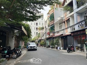 bán nhà mặt tiền ngay chợ hoàng hoa thám - 5x14 - gpxd 6 tầng - khai thác ~1tỷ/năm - giá 11,7 tỷ