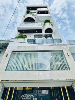 nhà đường lê văn thọ ngay công viên làng hoa phong cách luxury có thang máy