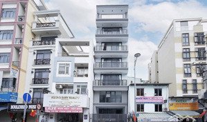 ngộp! giảm sâu 4 tỷ! bán nhà mặt tiền ngang 5m ngay cách mạng tháng 8 q3, 7 tầng thang máy