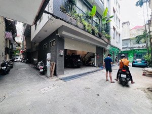 toà văn phòng đống đa - lô góc 2 mặt ngõ oto tránh - 7 tầng thang máy - phân lô vip đống đa