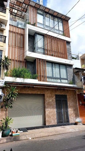 nhà mặt tiền đẹp, ngang 8m, thiết kế hiện đại, 4 tầng kiên cố, 3pn, đủ nội thất, chỉ nhỉnh 6 tỷ