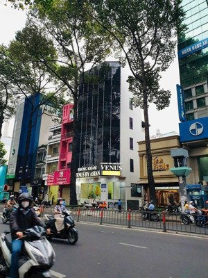 bán tòa nhà mặt tiền quận 10- dòng tiền 10.000usd/ tháng- giá 115 tỷ( tl)- lh0937921939