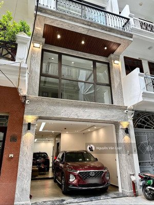 bán nhà lạc long quân tây hồ 51m2, 6 tầng, nhà mới, ngõ thông, gara ô tô, kinh doanh, sát hồ tây