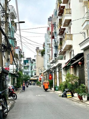 bán nhà mặt tiền hẻm nhựa hương lộ 2 ( 66m2 , 5 tầng, 8 phòng ) dòng tiền hàng tháng.