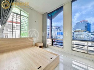 1 phòng ngủ cửa sổ + bancony 40m2 full nt mới - ngã tư phú nhuận - gần cầu kiệu tiện qua quận 1