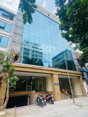 bán nhà trần thái tông, toà vp 155m2, 8t, mt 8,5m, vỉa hè, ô tô tránh, giáp phố, dòng tiền 2tỷ/năm