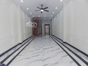 bán nhà nguyễn ngọc vũ, dt 49m2, mt 4,7m, nhà 6 tầng thang máy, ô tô vào nhà, gần phố, kinh doanh